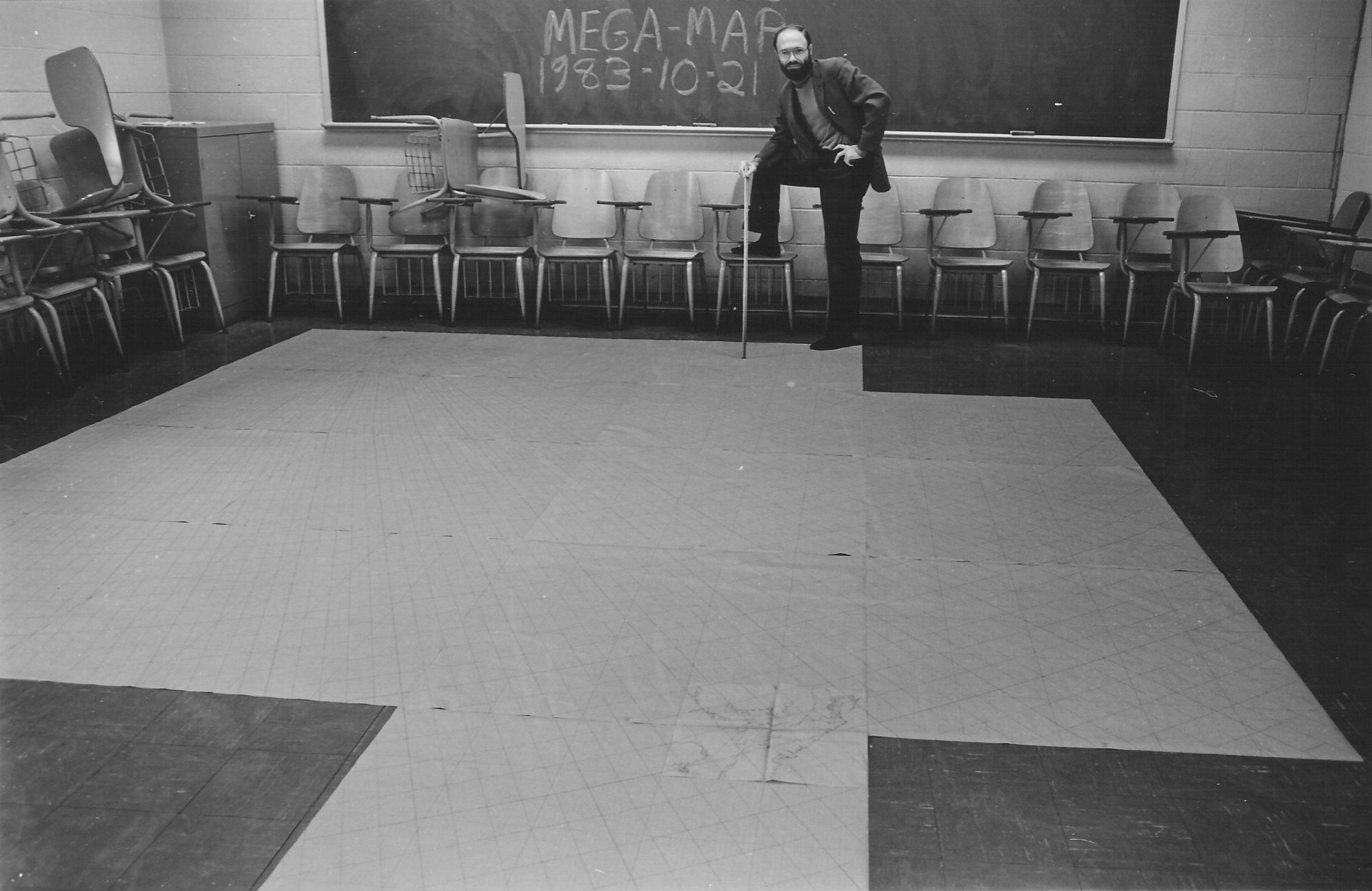 13 meter-square panels of Cahill-Keyes Mega-map graticule template on classroom floor
