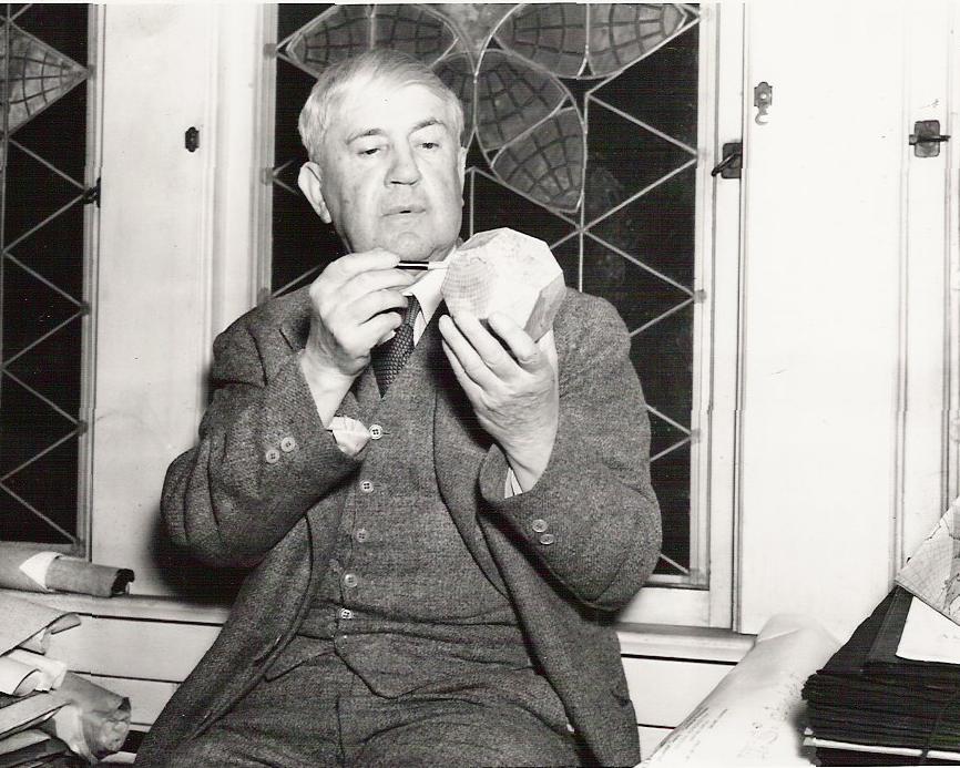 B.J.S. Cahill holding truncated octahedron of Butterfly world map